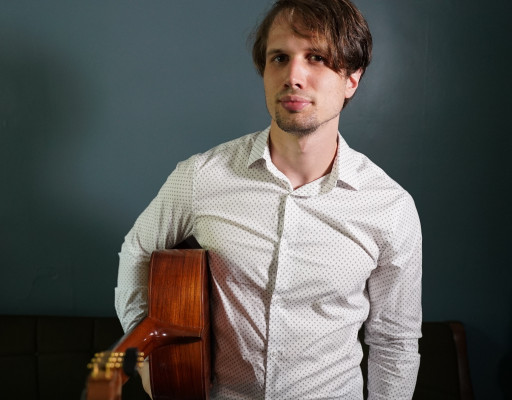 Headshot of Austin-based composer, Matthew Lyons