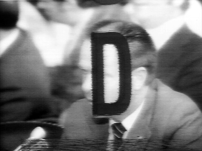 image of a man's face with the letter "D" superimposed