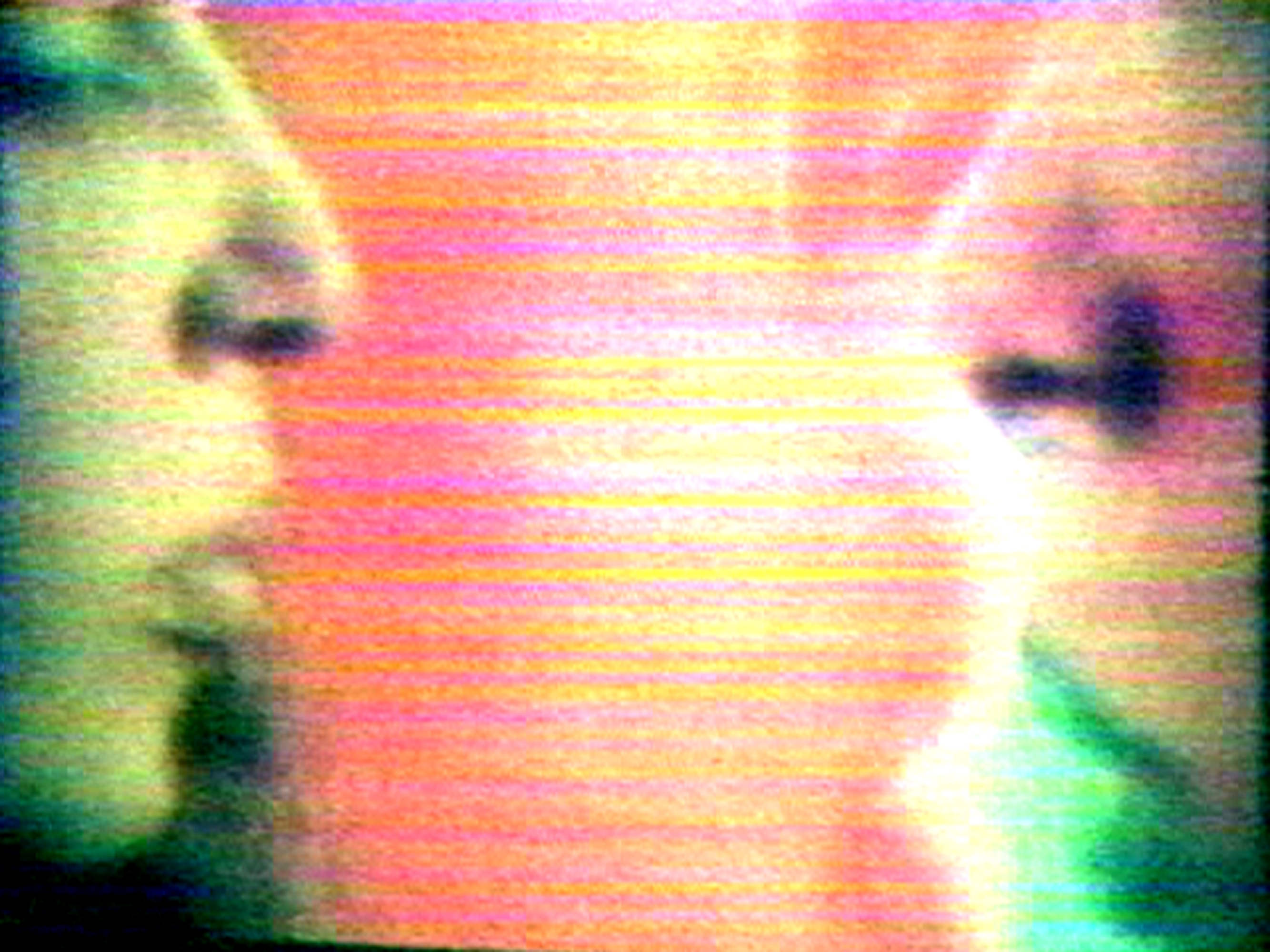 Film still with profiles of two people