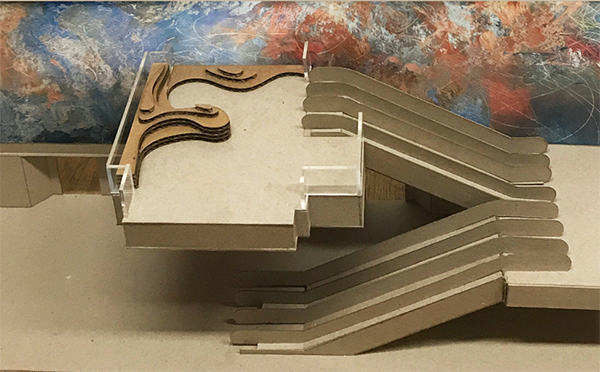 model of seating in front of mural