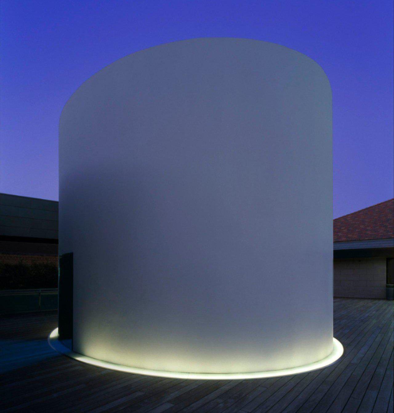 A photo of James Turrell's "The Color Inside" at night