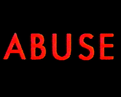 A dark background with "ABUSE" written in large red letters