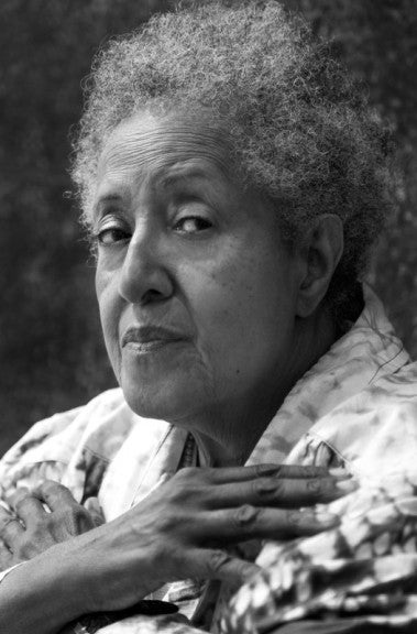 A black and white headshot of artist Howardena Pindell