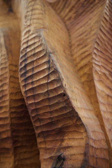 Detail of a cherry wood sculpture in a large rotunda