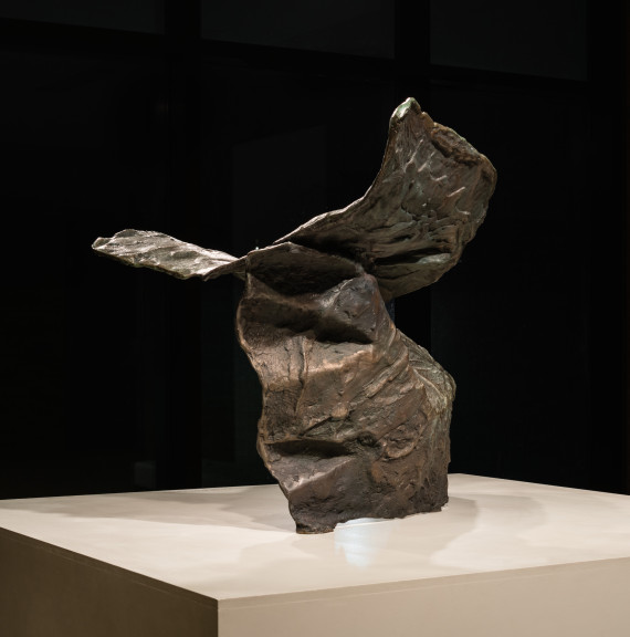 A winged sculpture on a base