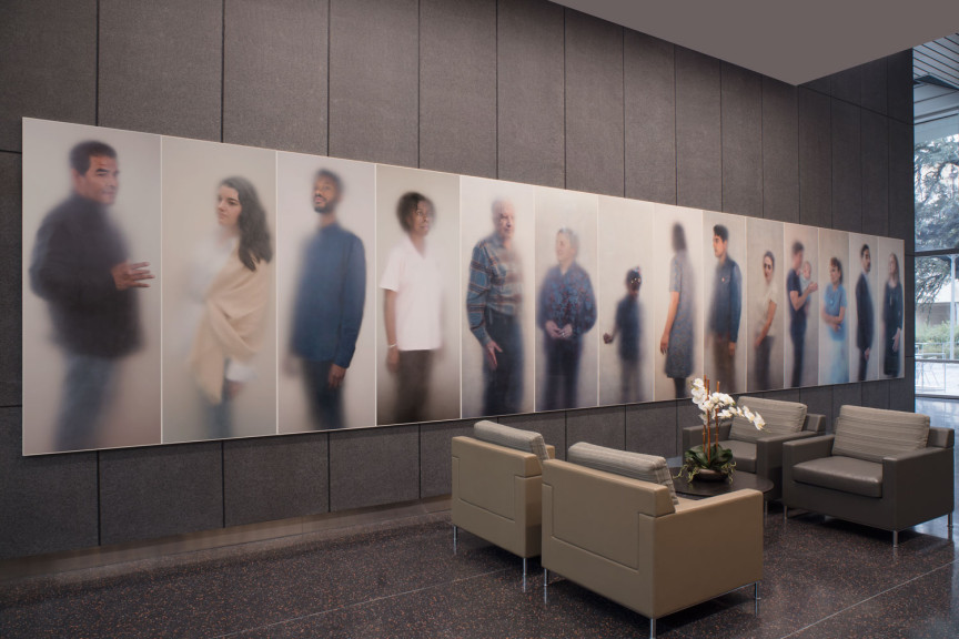 A large wall of hazy photographs