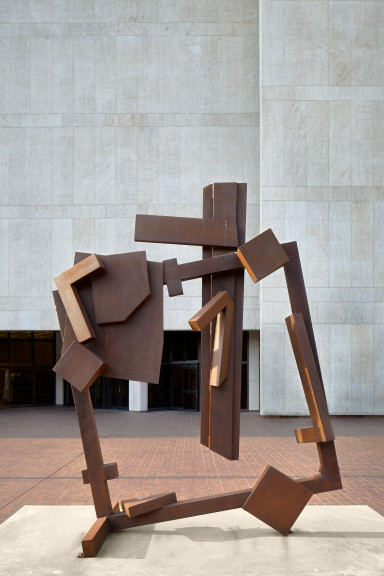 A square sculpture tilted at an angle
