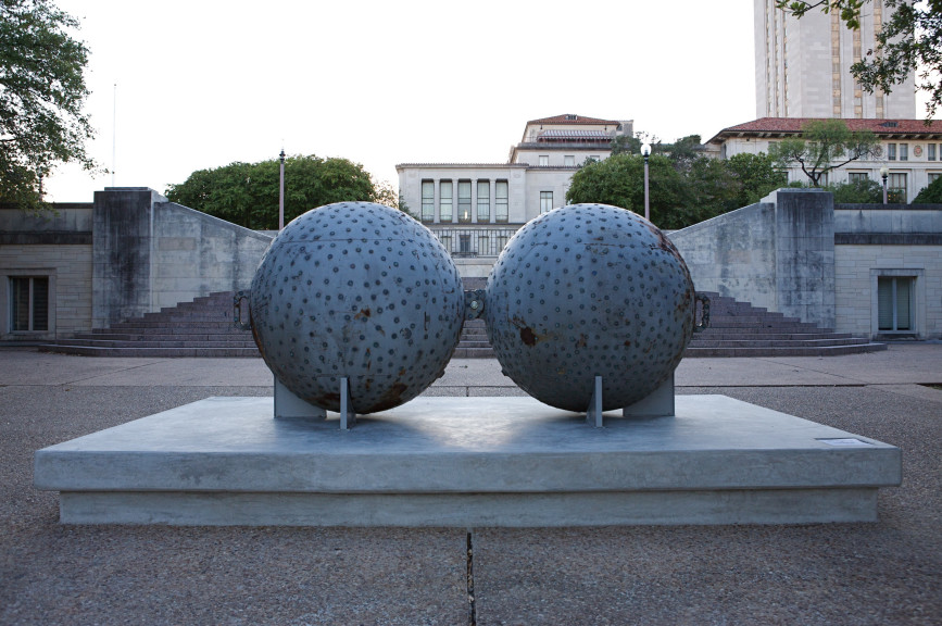 two spheres on platform