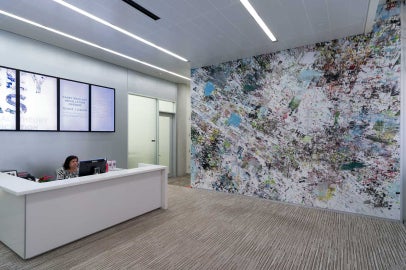 An office with a large wall mural