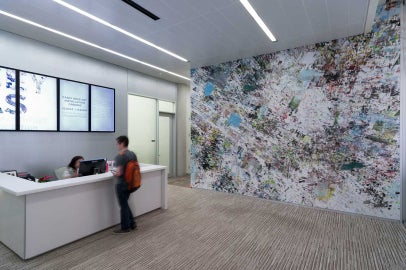 An office with a large wall mural