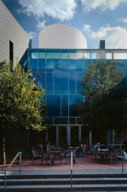 A cylindrical structure on a rooftop