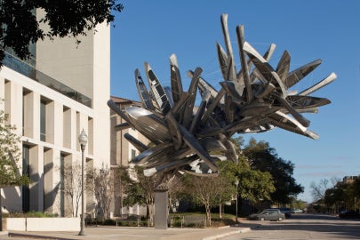 A large metal sculpture of boats