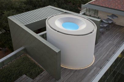 bird's-eye view of circular structure with blue inside