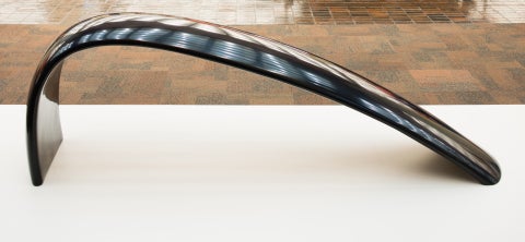 A black curved sculpture