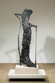 A curved sculpture on a base
