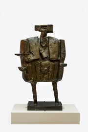 A sculpture in the shape of a human figure