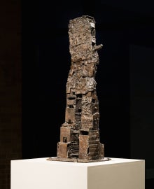 A tall sculpture on a pedestal