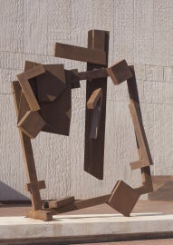 A square sculpture tilted at an angle