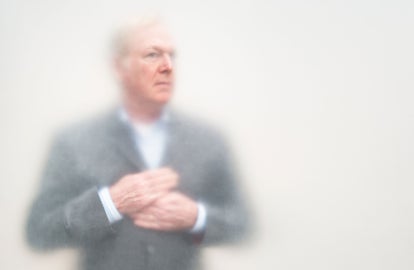 A man in a grey suit