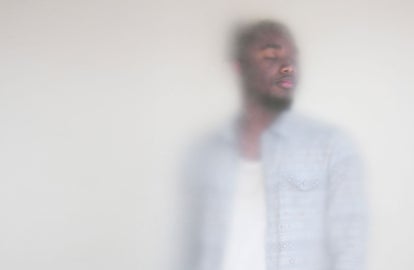 A man in a light blue shirt