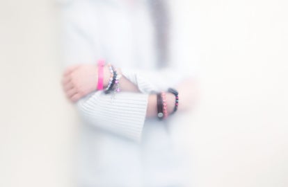 A woman crossing her arms
