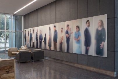 A large wall of hazy photographs