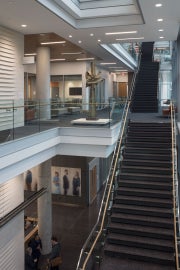 A large educational building with public art