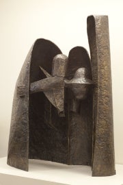 A dark rounded sculpture