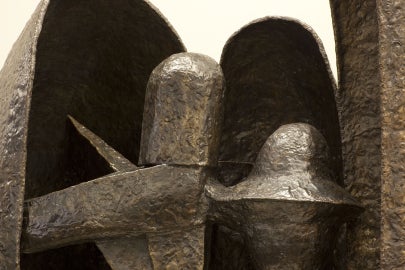 A dark rounded sculpture