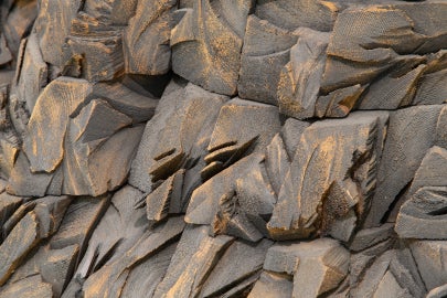 A detail of Ursula von Rydingsvard's "Untitled (Seven Mountains)"