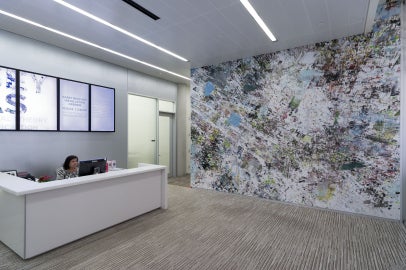 desk with digital screens and colorful
