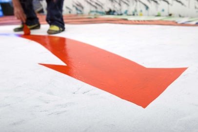 red arrow on white surface
