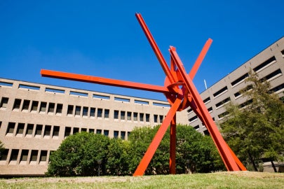 A large red metal sculpture 