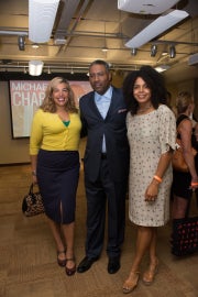 Two women and a man