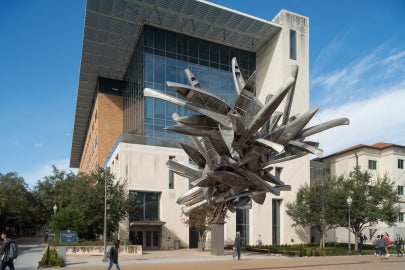 outdoor sculpture made out of canoes