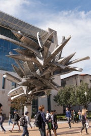 outdoor sculpture made out of canoes