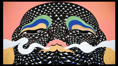 black illustrated face with patterns