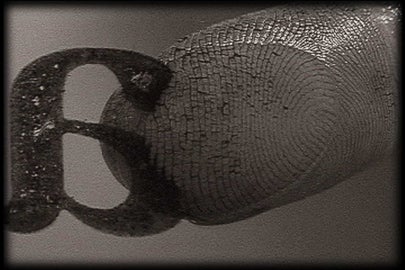 backwards letter a and a finger print pressed