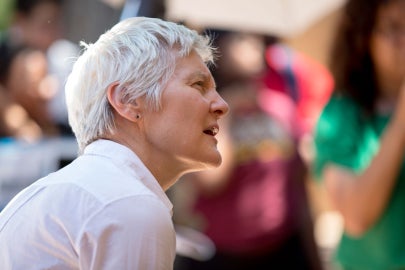 A woman wearing white
