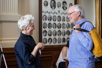 A woman talking to a man