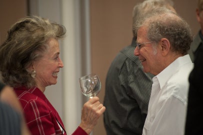 two people facing each other in conversation
