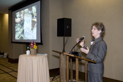 woman speaking with microphone