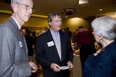 three people talking
