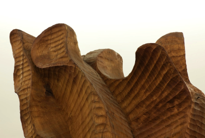 Curvy wooden shape against white background