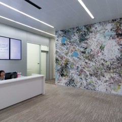 An office with a large wall mural