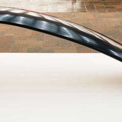 A black curved sculpture