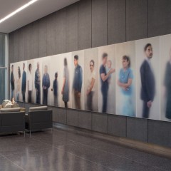 A large wall of hazy photographs