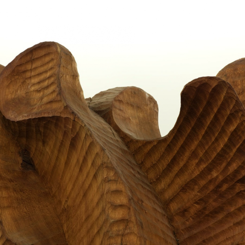 Detail of a cherry wood sculpture in a large rotunda