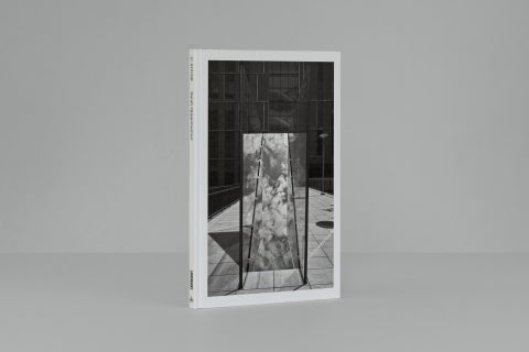 A black and white book against a gray background