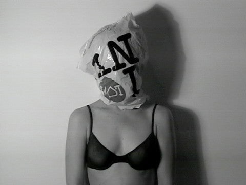 Cheryl Donegan, Artists + Models, 1998 A woman in a bra with a plastic bag over her head